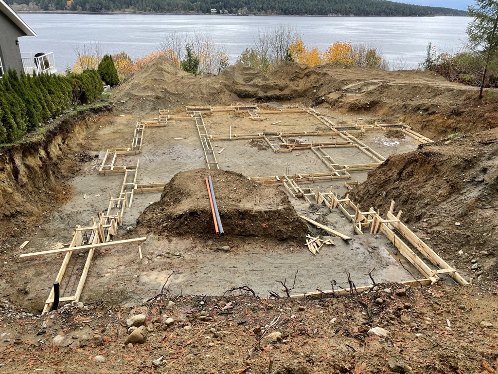 Foundation forms laid out on a waterfront building site
